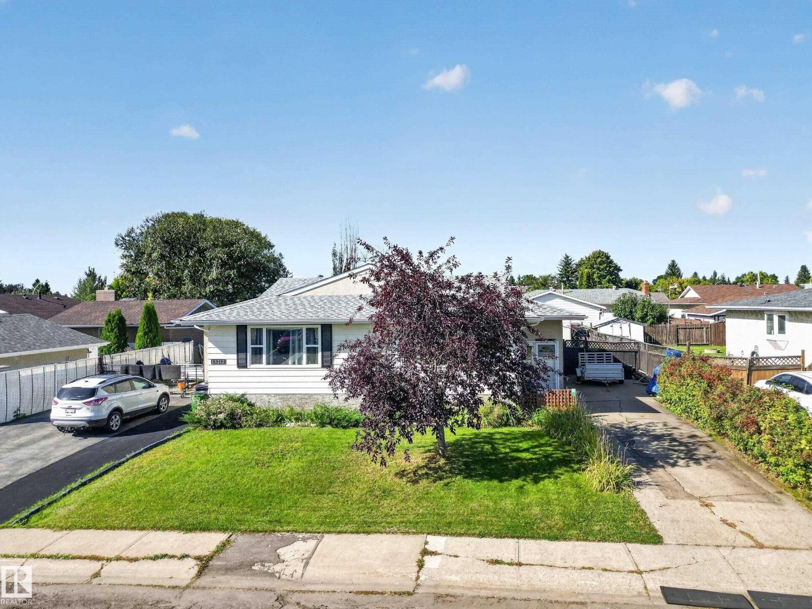 Property Photo:  13214 38 St NW  AB T5A 3G4 