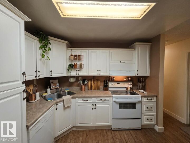 Property Photo:  #403 2620 Mill Woods Rd E NW  AB T6L 5K6 
