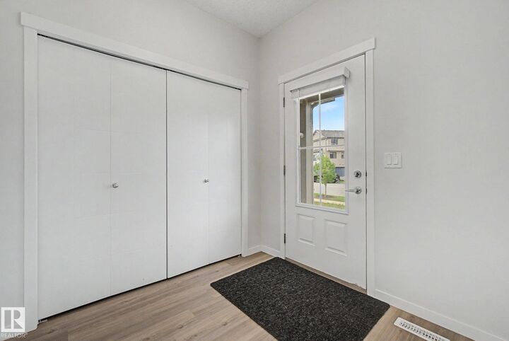 Property Photo:  11929 35 Avenue SW  AB T6W 4N3 