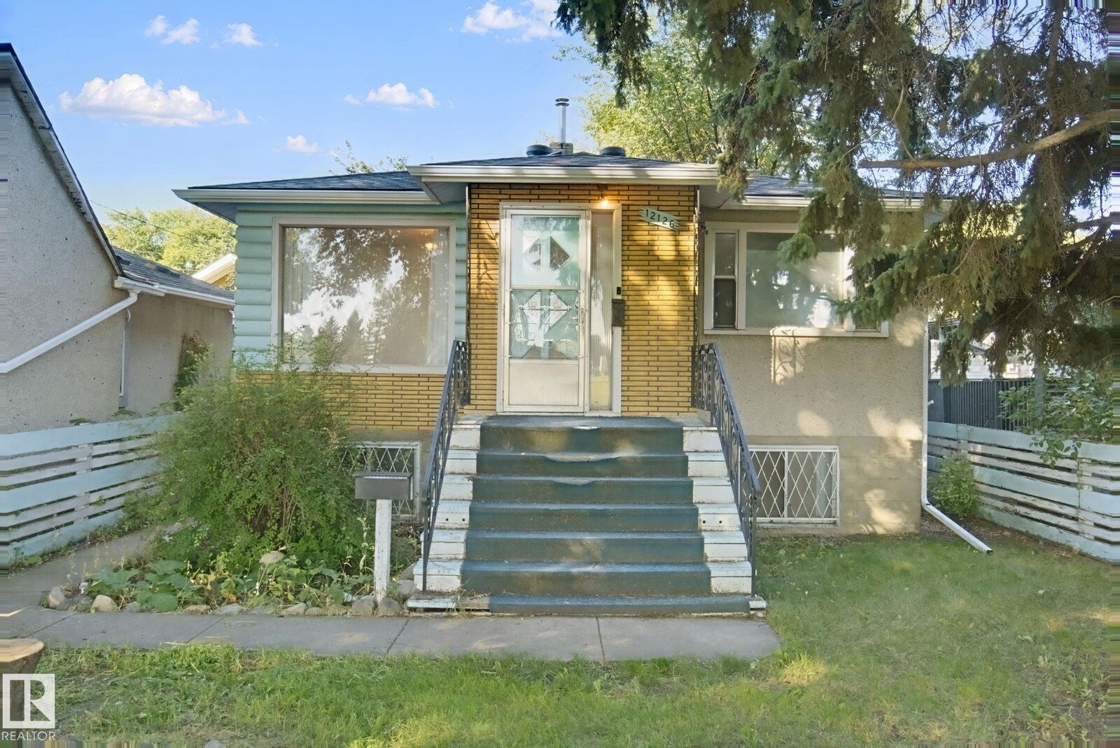 Property Photo:  12126 57 Street NW  AB T5W 3W1 