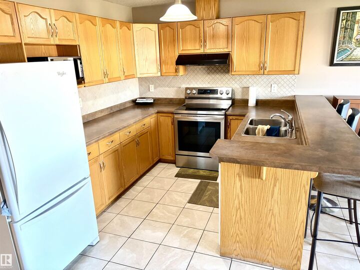 Property Photo: 16317 64 Street NW 17 AB T5Y 3M3