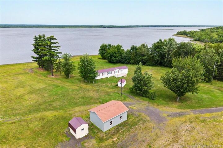 Property Photo:  388 Cox Point Road  NB E4A 2X7 
