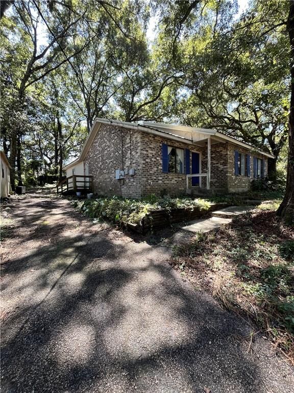 Property Photo: 8309 Lake Ponchartrain Drive AL 36582