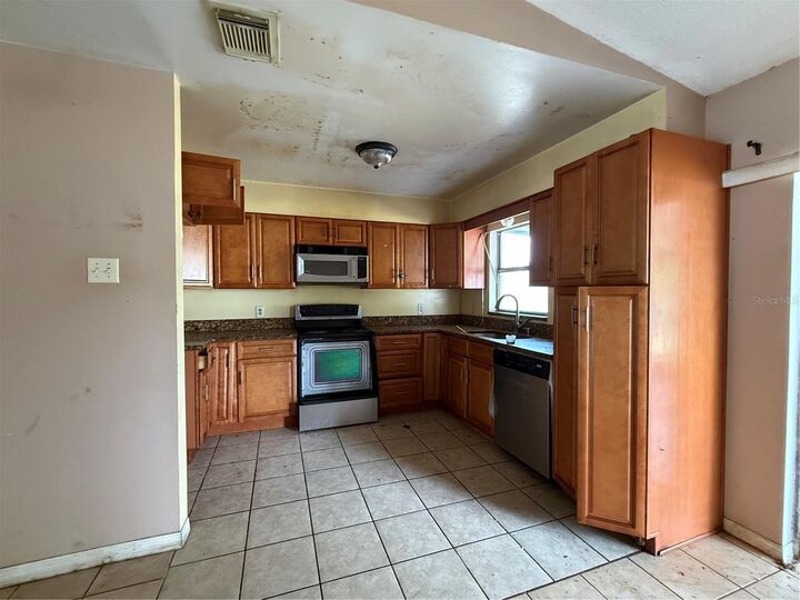 Property Photo:  303 Cortez Court  FL 34758 