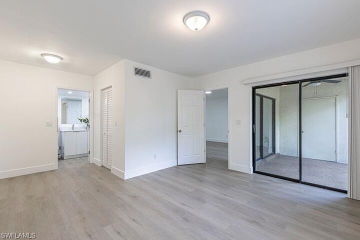Property Photo:  1765 Courtyard Way 103  FL 34112 