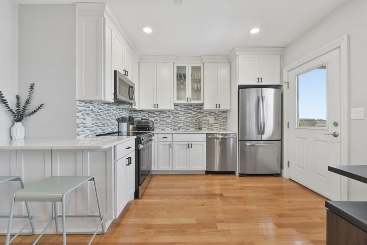 Property Photo:  214-216 E Eagle St 5A  MA 02128 