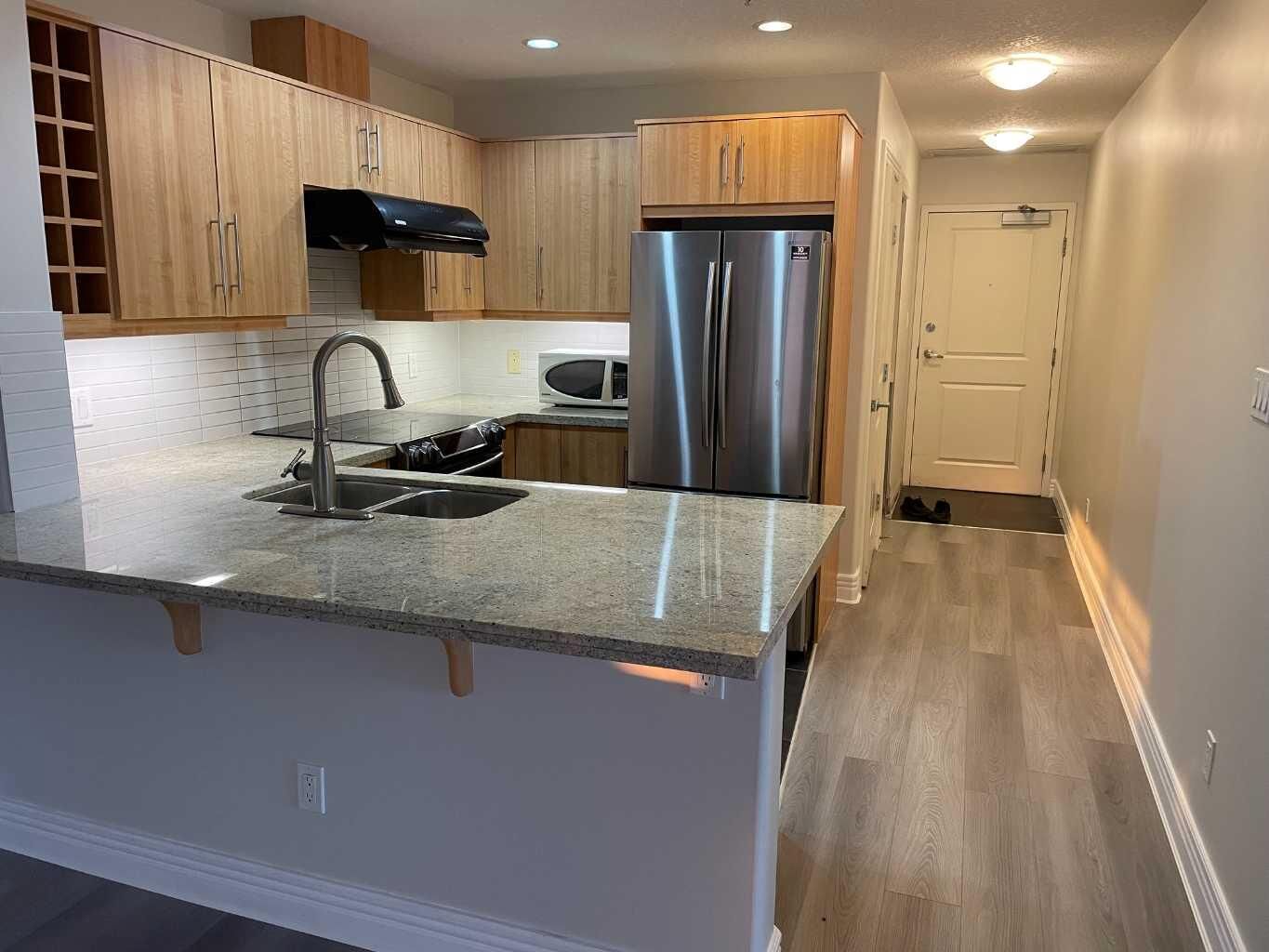 Property Photo:  55 Spruce Place SW 1406  AB T2Y 4W7 