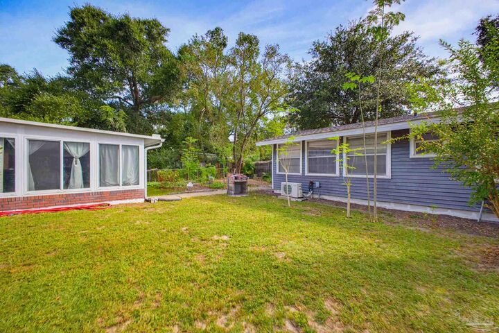 Property Photo:  700 N 79th Ave  FL 32506 