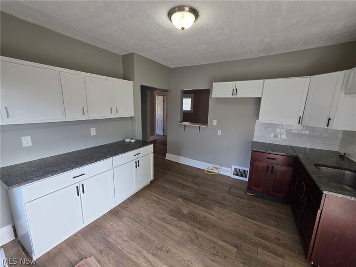 Property Photo: 3213 Louisiana Avenue OH 44109