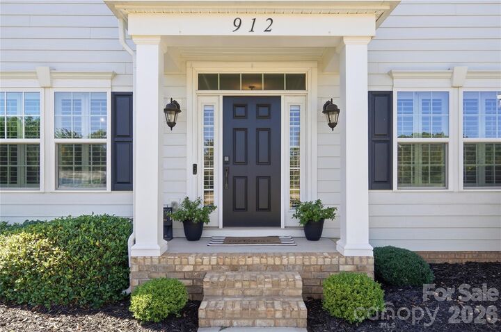Property Photo:  912 Manorwood Drive  NC 28173 