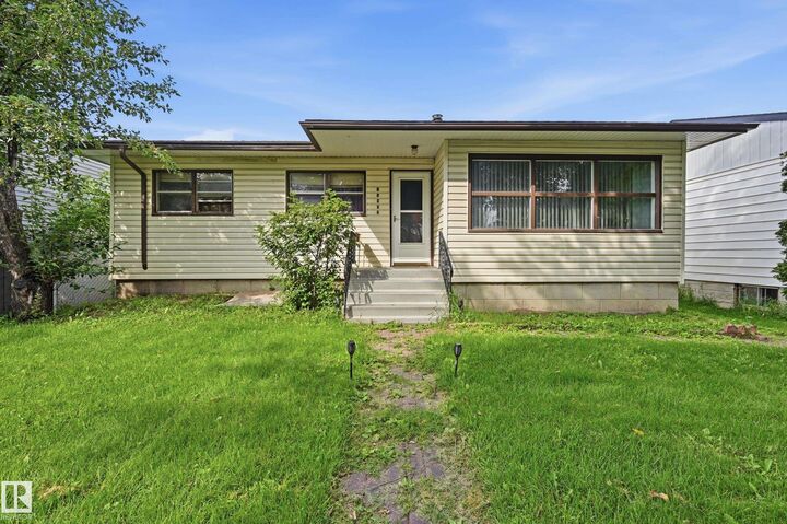 Property Photo:  11622 133 Street NW  AB T5M 1H5 