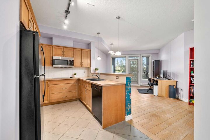 Property Photo:  3111 34 Avenue NW 203  AB T2L 0Y2 