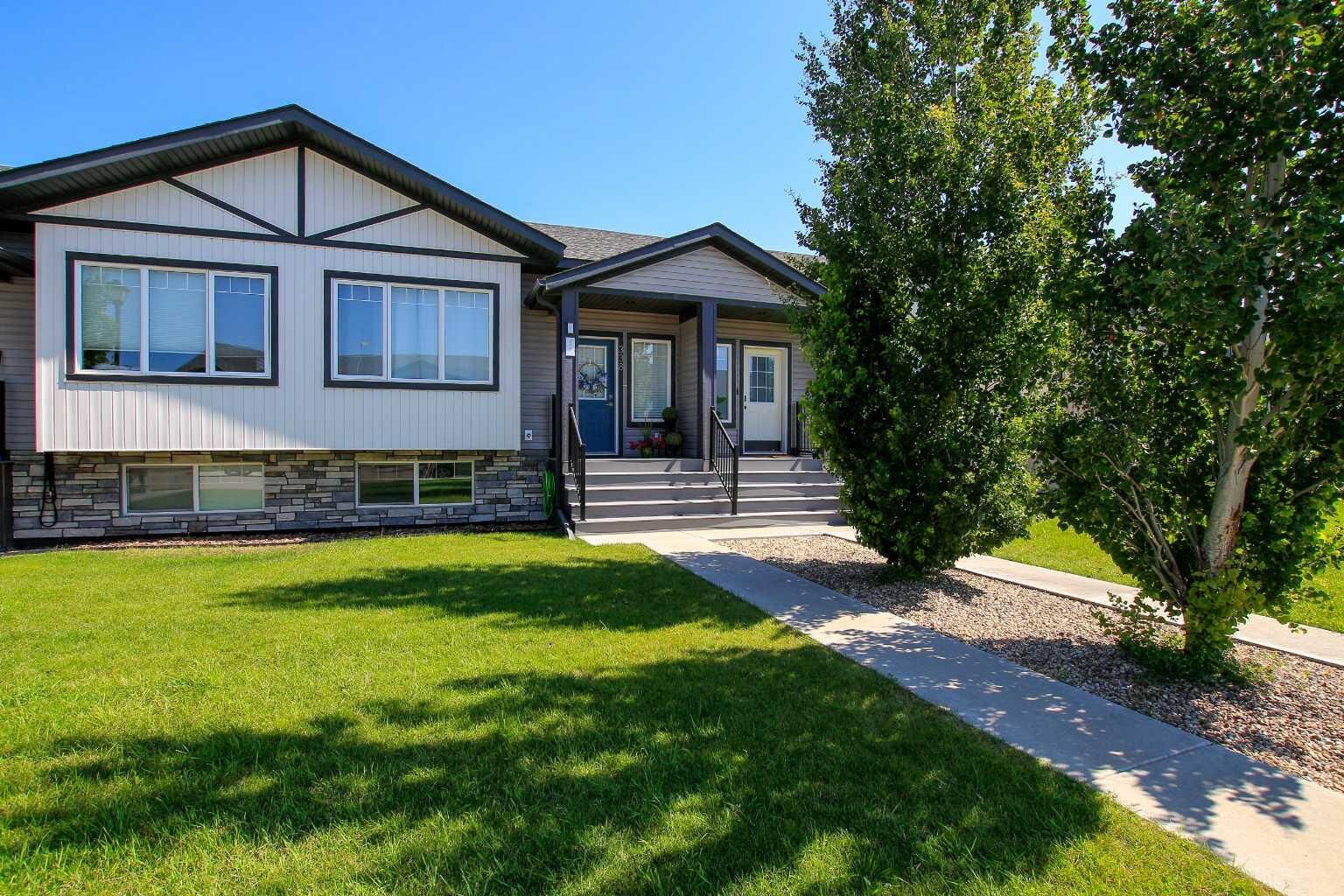 Property Photo: 338 Spruce Street AB T4S 0N9