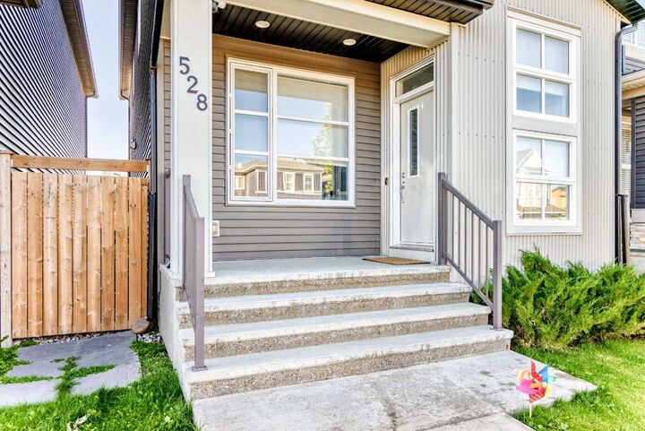 Property Photo:  528 Belmont Heath SW  AB T2X 4H2 