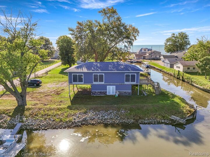 Property Photo:  6809 Lakeshore Drive  MI 48166 