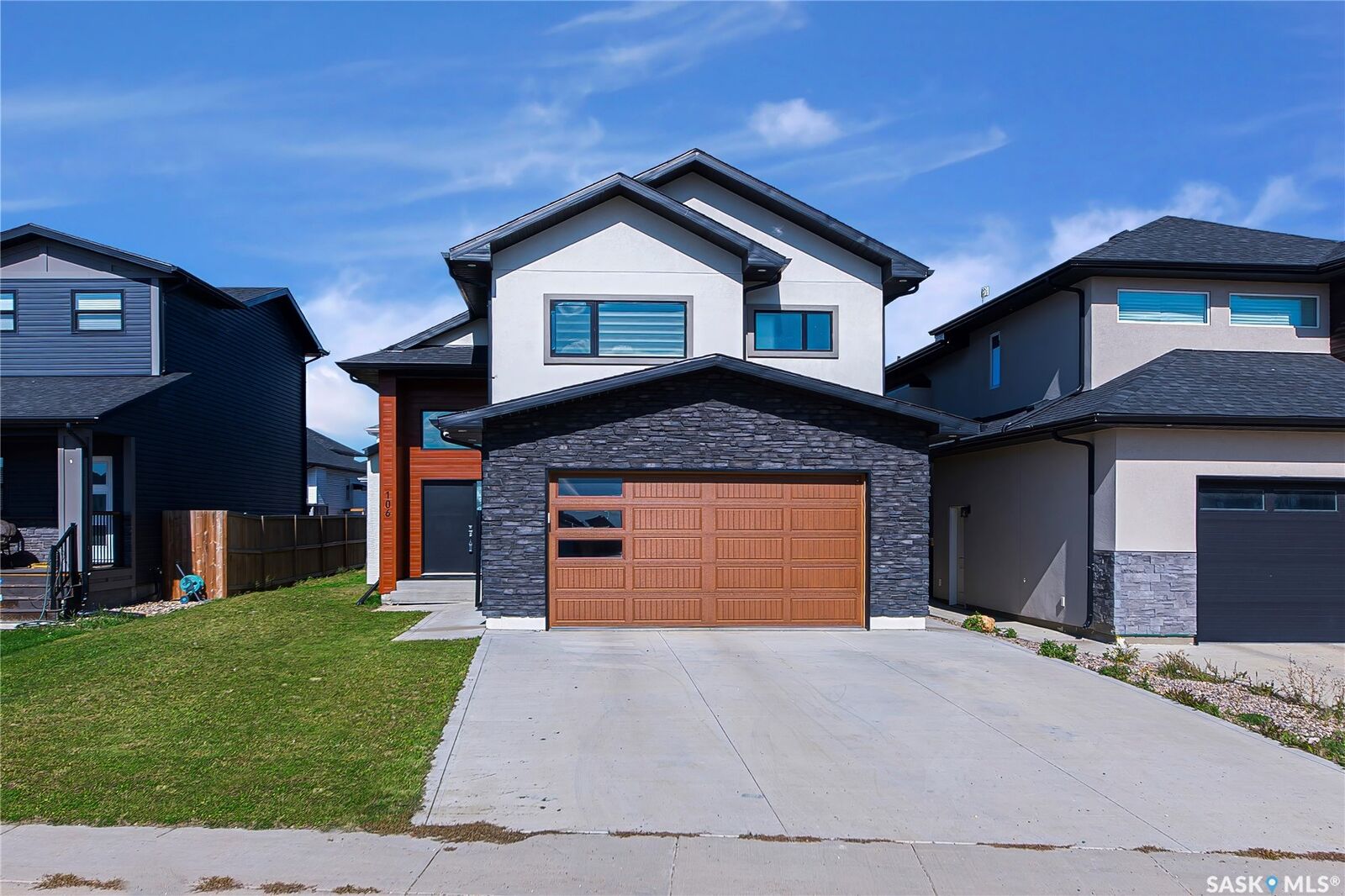 Property Photo:  106 Kenaschuk Crescent  SK S7W 0Y6 