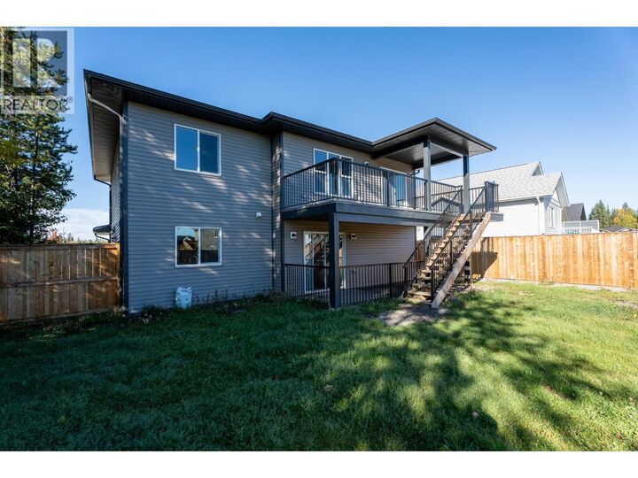 Property Photo:  5590 Woodvaley Drive  BC V2K 5A6 