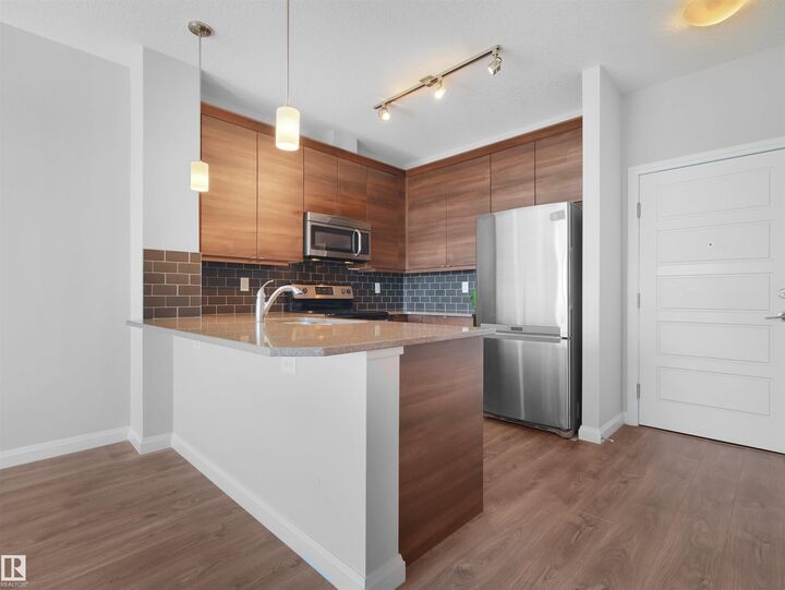Property Photo: 2588 Anderson Way SW 415 AB T6W 0R2