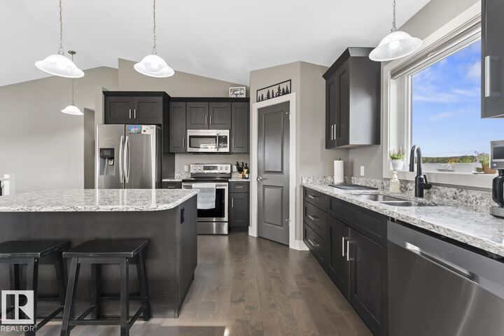 Property Photo:  5705 49 Street  AB T9M 0E8 