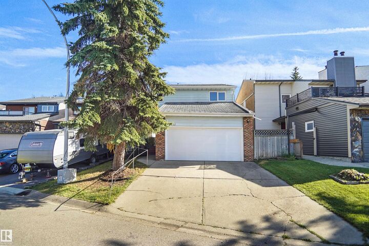 Property Photo:  12311 25 Avenue NW  AB T6J 4S7 