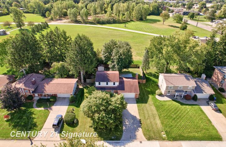 Property Photo:  4925 Century Drive  MI 48638 