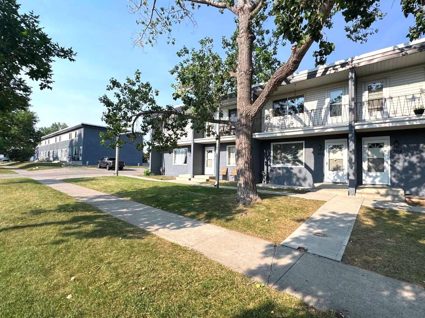 Property Photo:  2211 19 Street NE 303  AB T2E 4Y5 