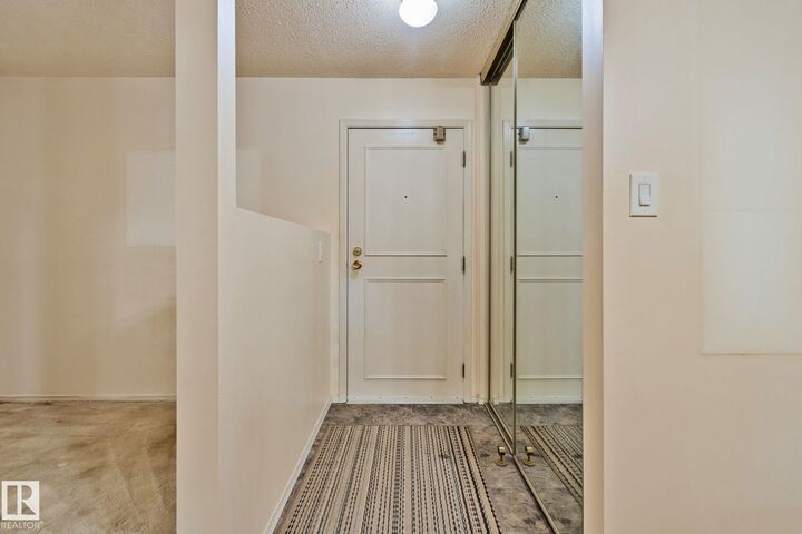 Property Photo:  10335 118 Street NW 305  AB T5K 1Y6 