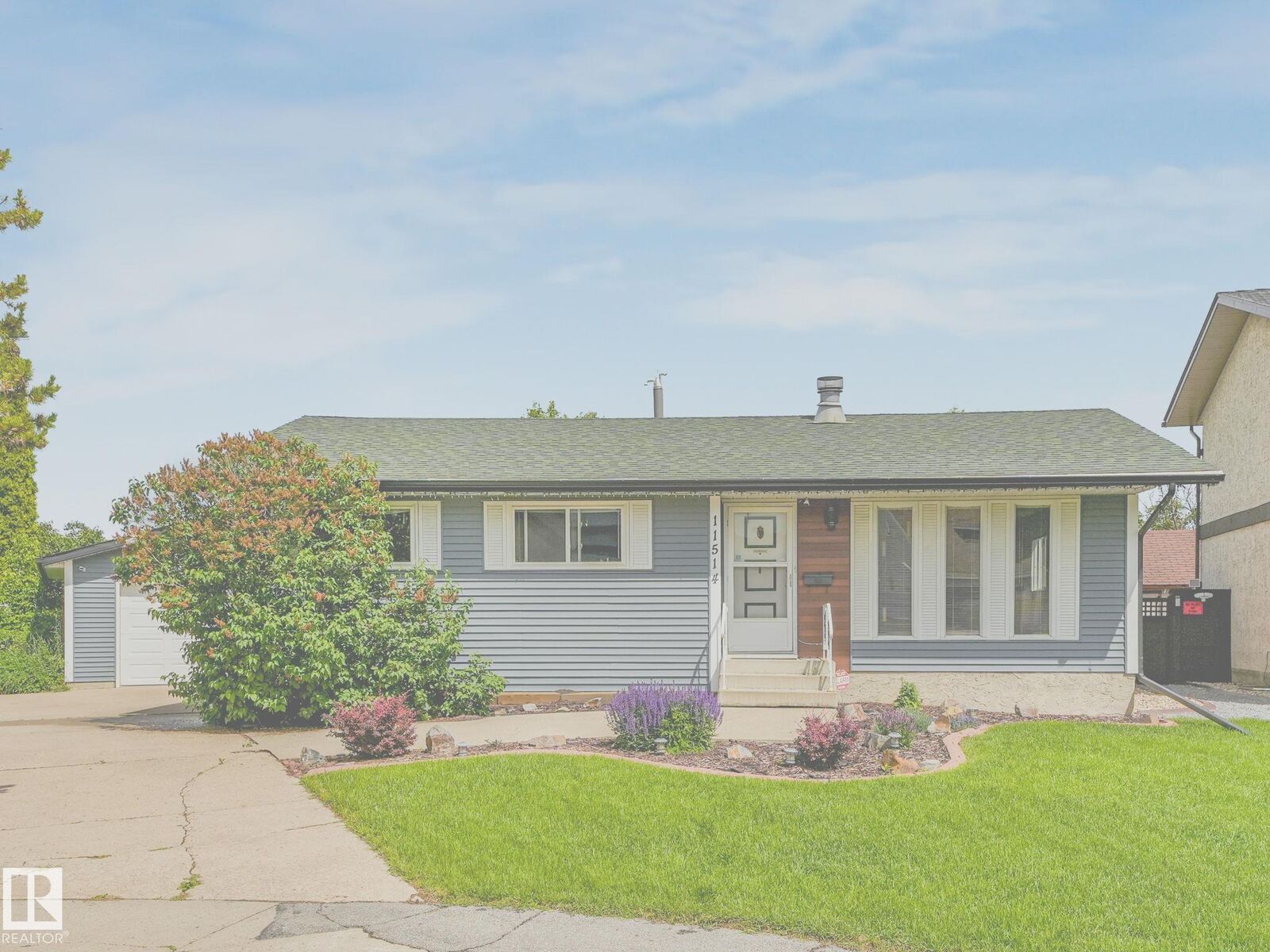 Property Photo:  11514 138 Avenue NW  AB T5X 3P4 