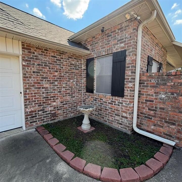Property Photo: 203 Pecanwood Drive LA 70605