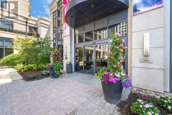 Property Photo: 6 Eva Road 207 ON M9C 0B1