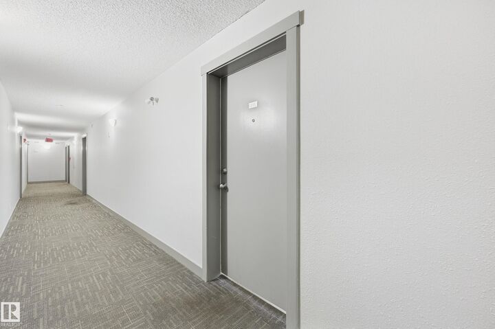 Property Photo:  11804 22 Avenue SW 215  AB T6W 2A2 
