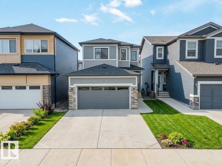 Property Photo:  7122 52 Ave Beaumont  AB T4X 2Z8 