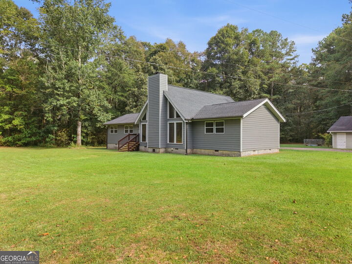 Property Photo: 1124 New Rosedale Road NE GA 30105