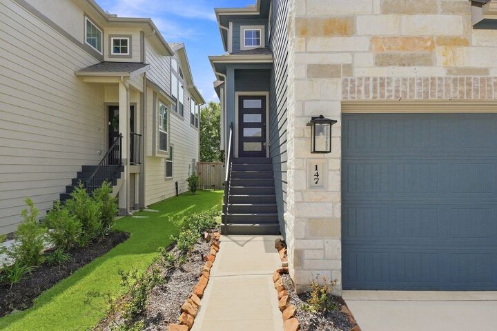 Property Photo:  147 W Coralburst Loop  TX 77316 