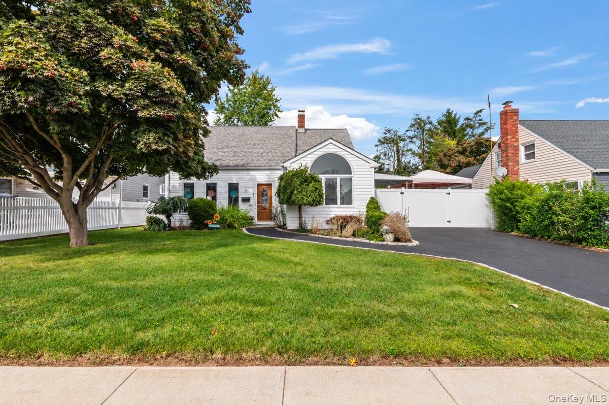 Property Photo: 61 Hollyhock Road NY 11756