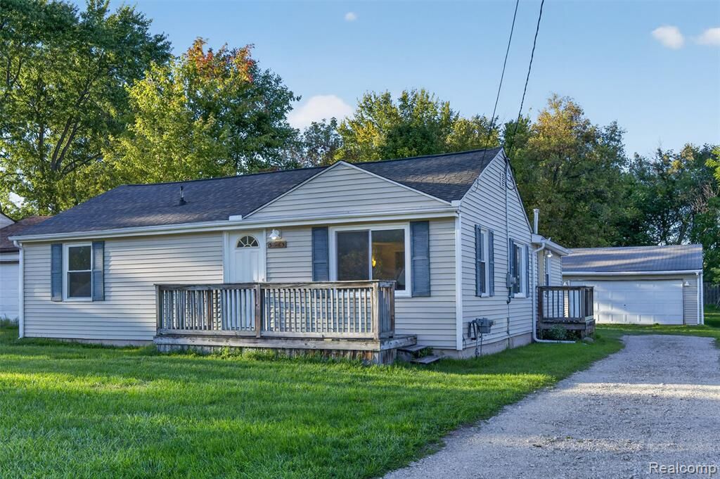 Property Photo:  5465 Raymond Avenue  MI 48509 1927 