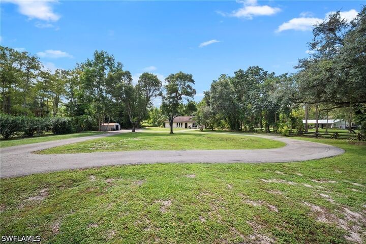 Property Photo:  5750 Westport Lane  FL 34116 
