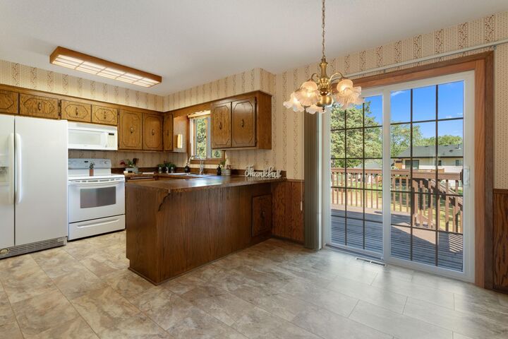 Property Photo:  3231 116th Lane NW  MN 55433 