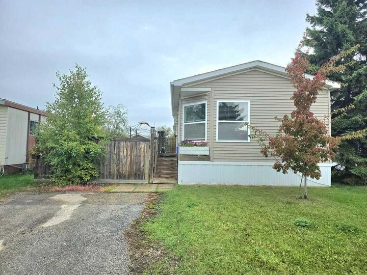 Property Photo:  812 6 Avenue SW 68  AB T0G 2A4 