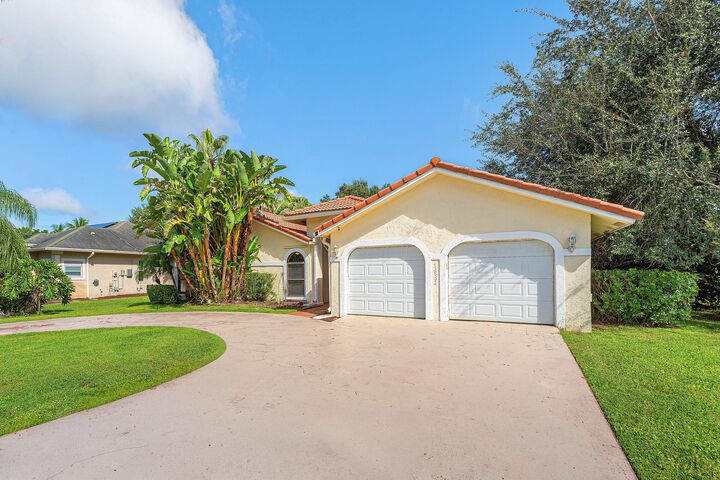 Property Photo:  13853 Sheffield Street  FL 33414 