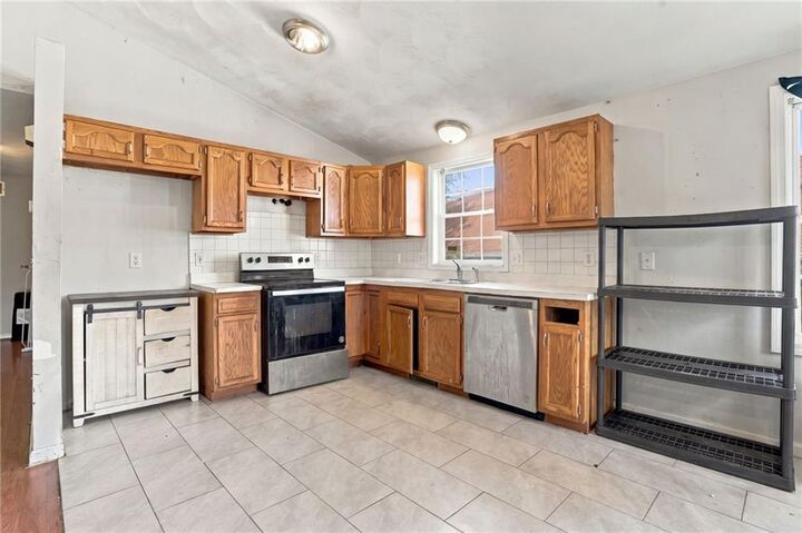 Property Photo:  147 Mount Saint Charles Avenue  RI 02895 