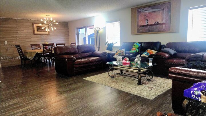 Property Photo:  18849 NW 78th Pl A  FL 33015 