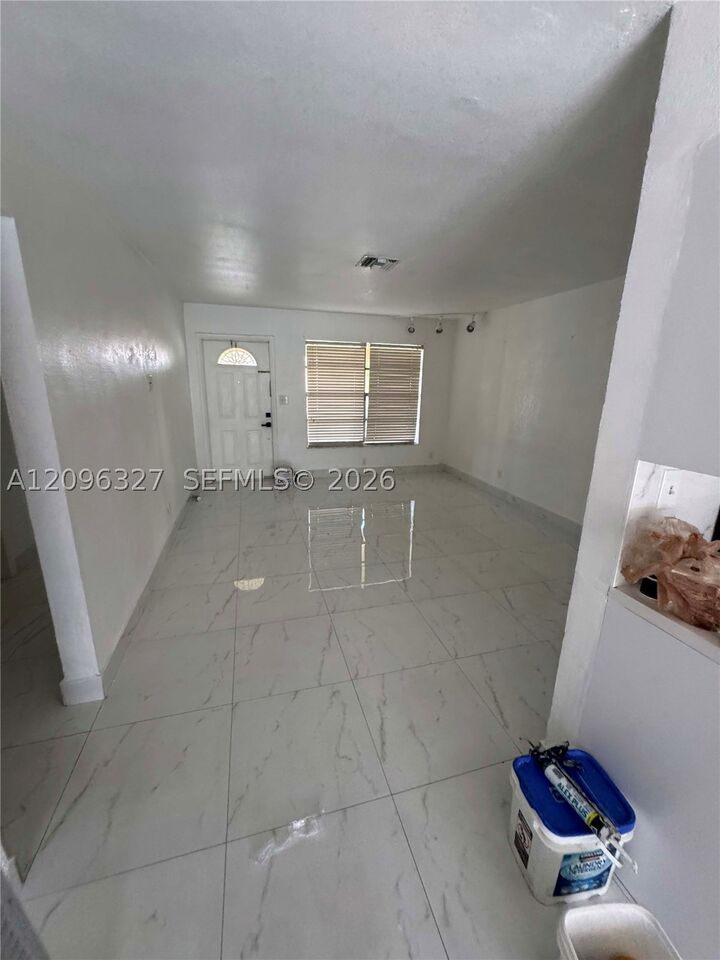 Property Photo:  1009 NE 2nd St  FL 33009 