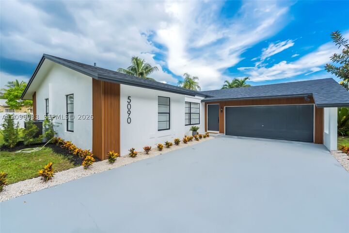 Property Photo:  5090 SW 11th St  FL 33068 