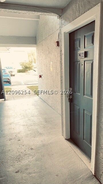 Property Photo:  10360 SW 150th Ct 12104  FL 33196 