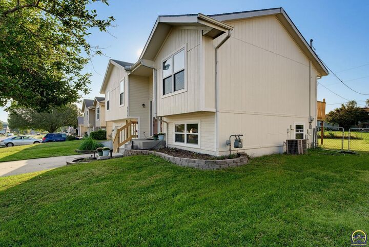 Property Photo:  7313 SW 23rd Ter  KS 66614 