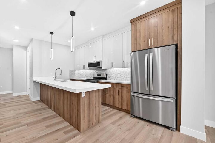 Property Photo:  1212 Waterford Drive  AB T1X 3A1 