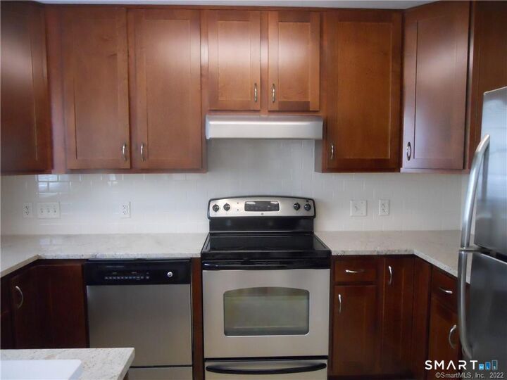 Property Photo: 66 Stoneridge Circle CT 06902