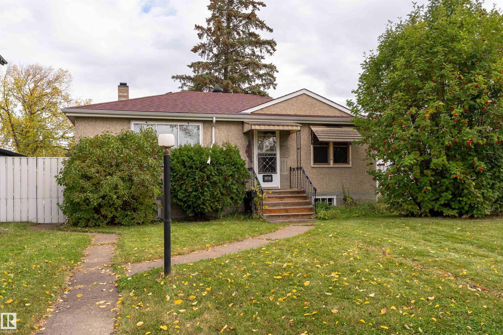 Property Photo: 10719 132 Street NW AB T5M 1C8