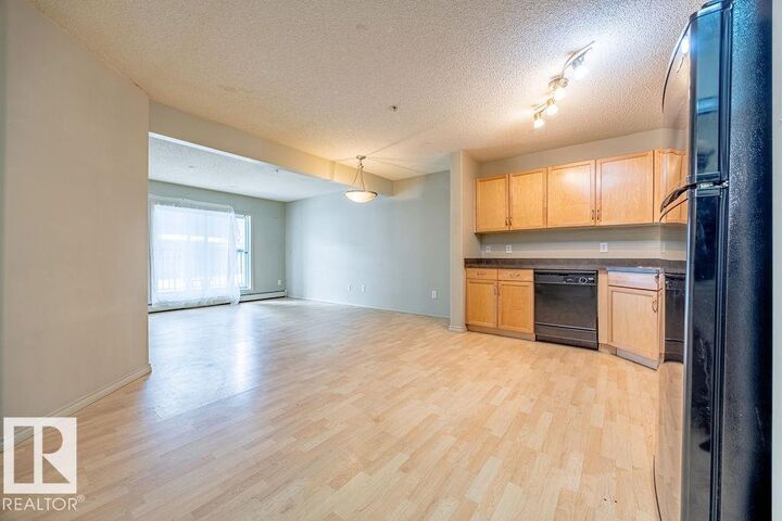 Property Photo:  646 McAllister Loop SW 122  AB T6W 0B5 